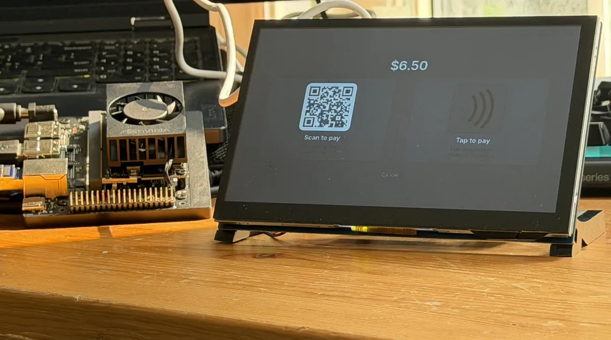 The bench kiosk at checkout, showing $6.50 with scan-to-pay and tap-to-pay, an NVIDIA edge computer on the left