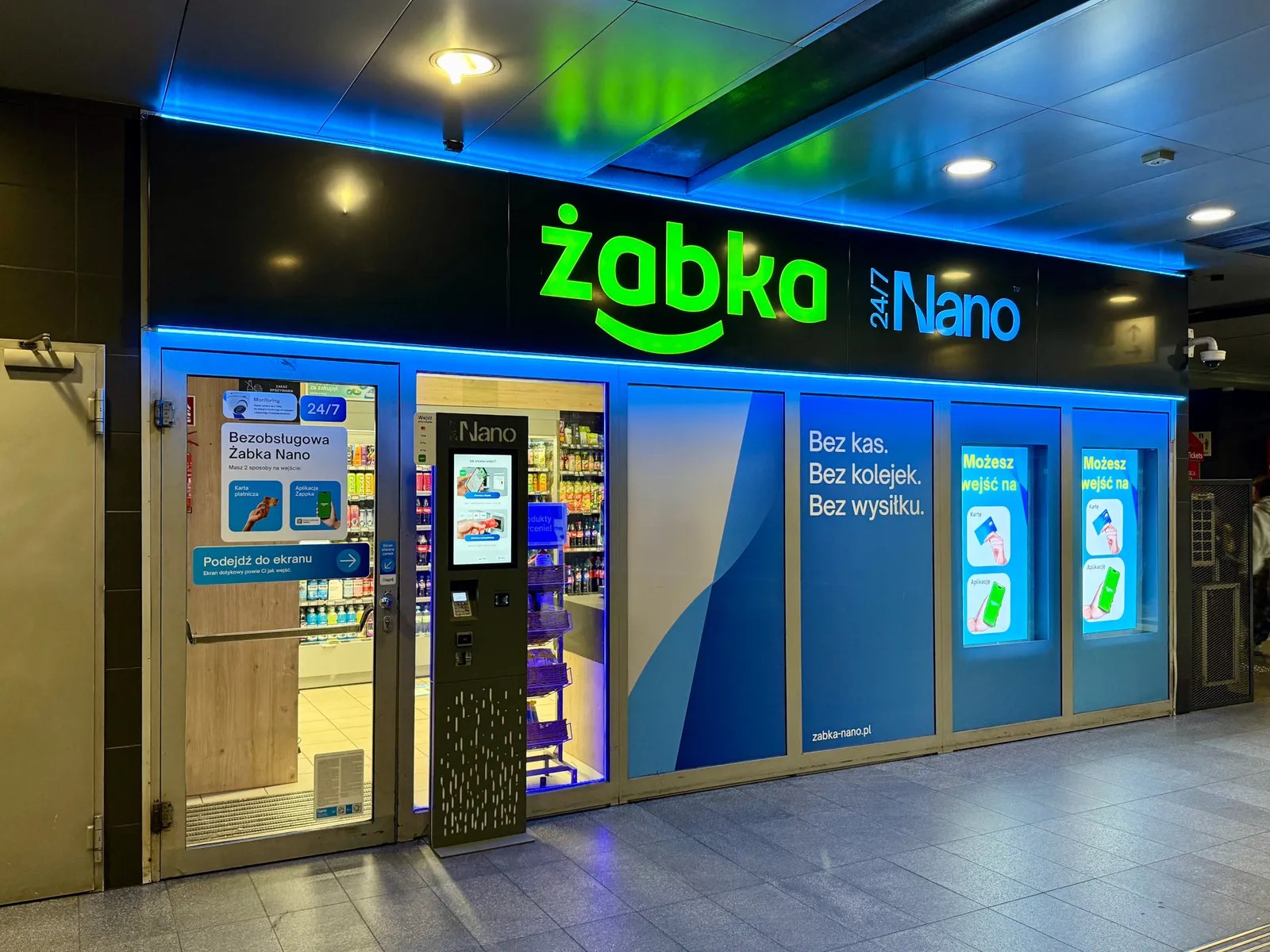 Żabka Nano checkout-free store inside a rail station concourse in Warsaw